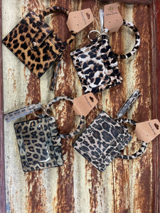 Leopard print wristlet wallets